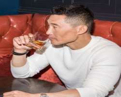 Daniel Dae Kim consuming alcohol